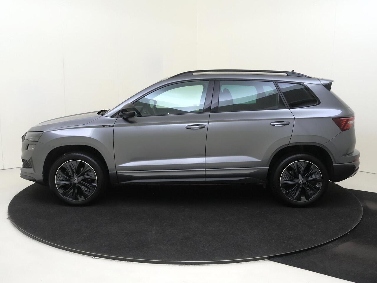 Skoda Karoq 1.5 TSI ACT Sportline Business | Trekhaak | Achteruitrijcamera | Keyless | Adaptieve cruise control | CarPlay | Digital cockpit | Navigatie |