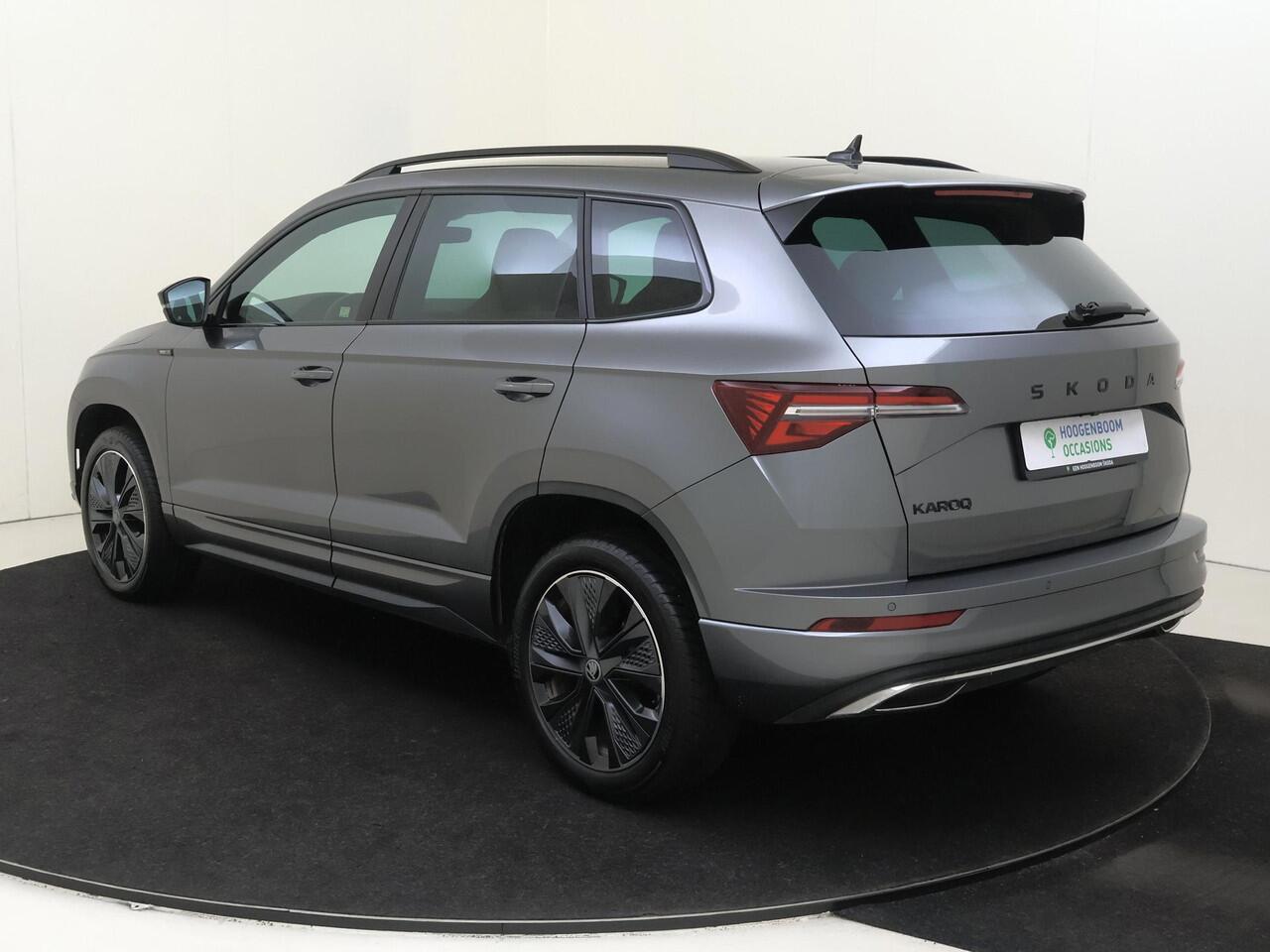 Skoda Karoq 1.5 TSI ACT Sportline Business | Trekhaak | Achteruitrijcamera | Keyless | Adaptieve cruise control | CarPlay | Digital cockpit | Navigatie |