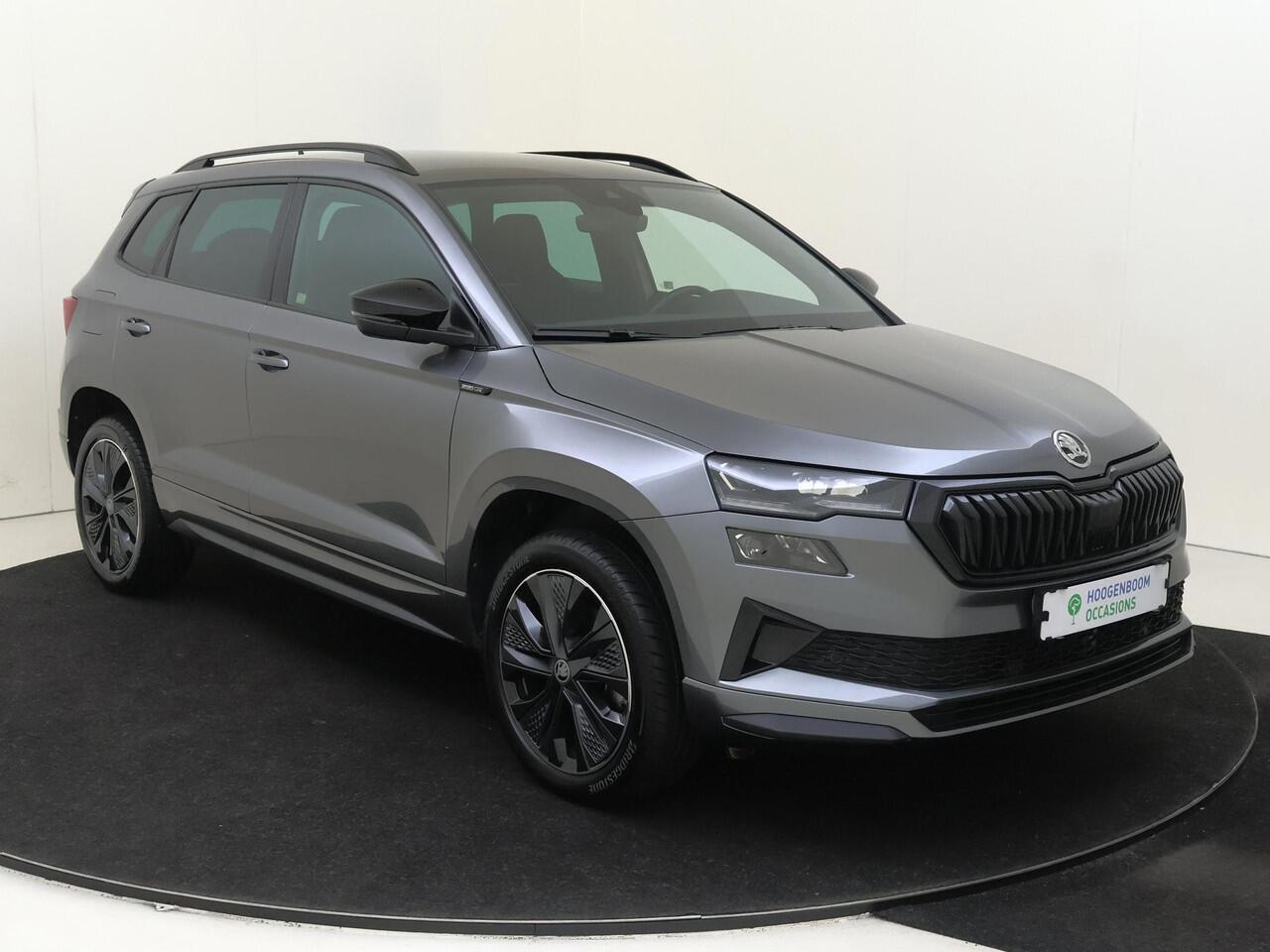 Skoda Karoq 1.5 TSI ACT Sportline Business | Trekhaak | Achteruitrijcamera | Keyless | Adaptieve cruise control | CarPlay | Digital cockpit | Navigatie |