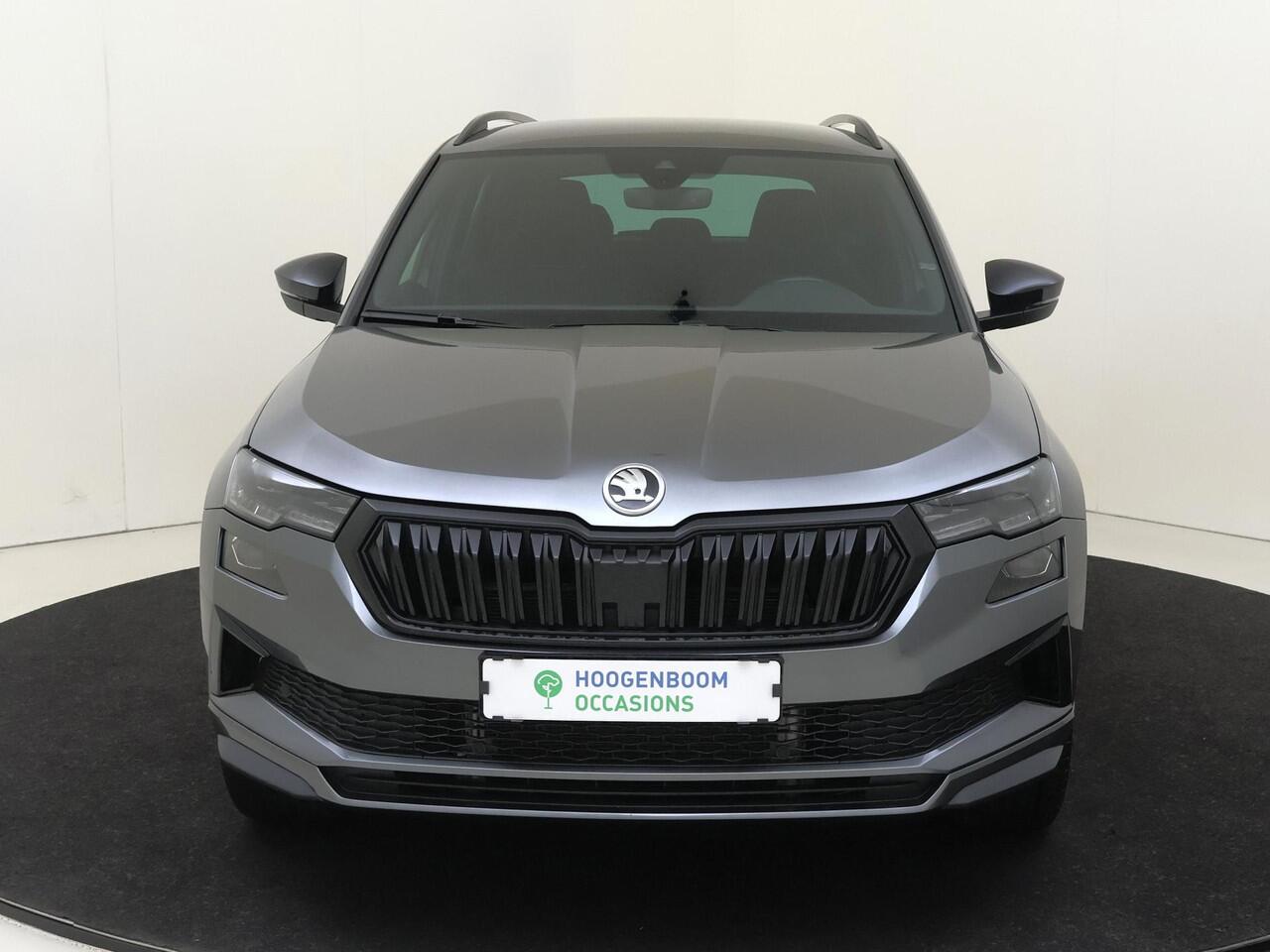 Skoda Karoq 1.5 TSI ACT Sportline Business | Trekhaak | Achteruitrijcamera | Keyless | Adaptieve cruise control | CarPlay | Digital cockpit | Navigatie |
