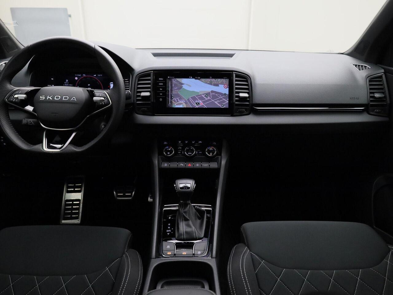 Skoda Karoq 1.5TSI/150PK ACT Sportline DSG · Navigatie · Trekhaak · Apple/Android Car Play · Camera · Garantie tot maart 2029 of 60000km.