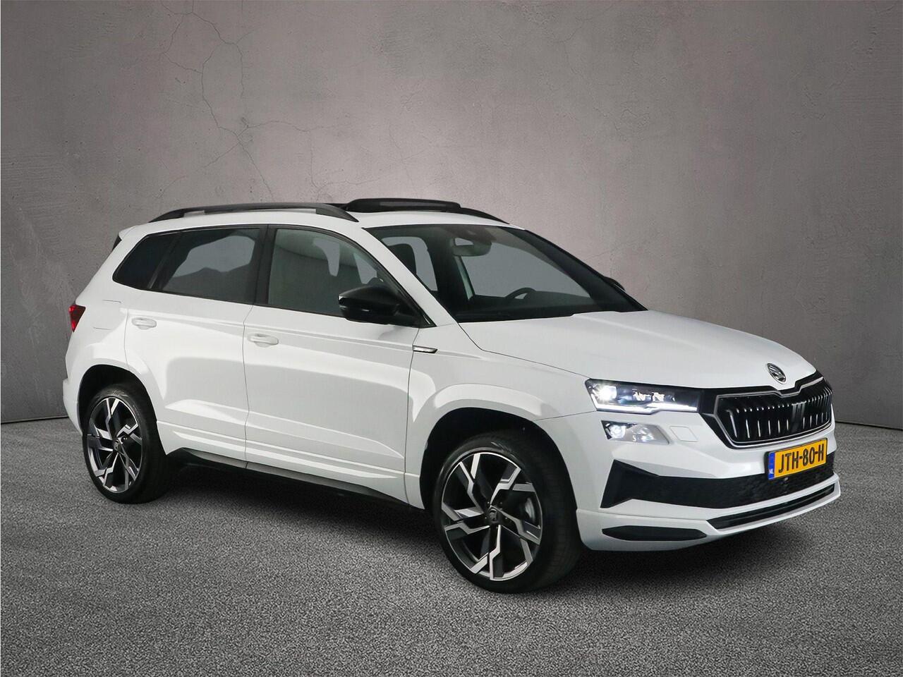 Skoda Karoq Sportline Business 1.5 TSI 150pk DSG Automaat Trekhaak, Panoramadak, CANTON audio, Adaptive cruise control, Elektrische achterklep, LED matrix koplampen