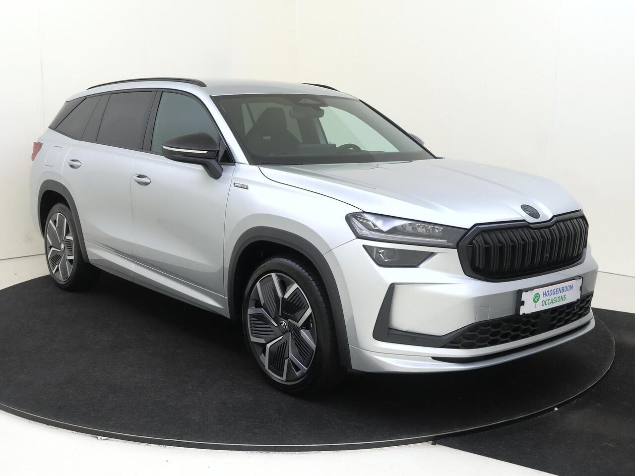 Skoda Kodiaq 1.5 TSI PHEV Sportline Business | Trekhaak | Achteruitrijcamera | 3-zone airco | Dodehoek detectie | Keyless | LED matrix verlichting | Adaptieve cruise control | Stoel- en stuurwielverwarming |