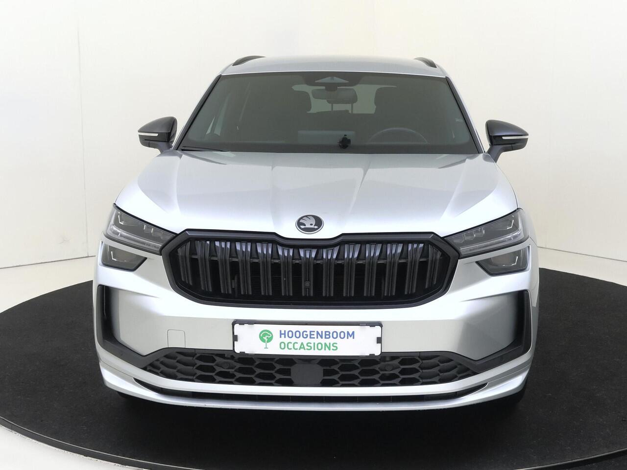 Skoda Kodiaq 1.5 TSI PHEV Sportline Business | Trekhaak | Achteruitrijcamera | 3-zone airco | Dodehoek detectie | Keyless | Adaptieve cruise control | CarPlay | Stoelverwarming |