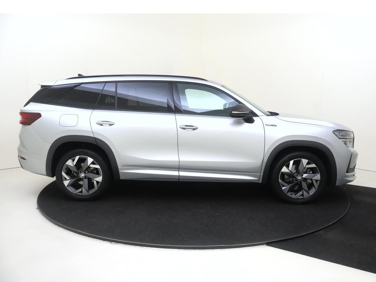 Skoda Kodiaq 1.5 TSI PHEV Sportline Business | Trekhaak | Achteruitrijcamera | 3-zone airco | Dodehoek detectie | Keyless | Adaptieve cruise control | CarPlay | Stoelverwarming |