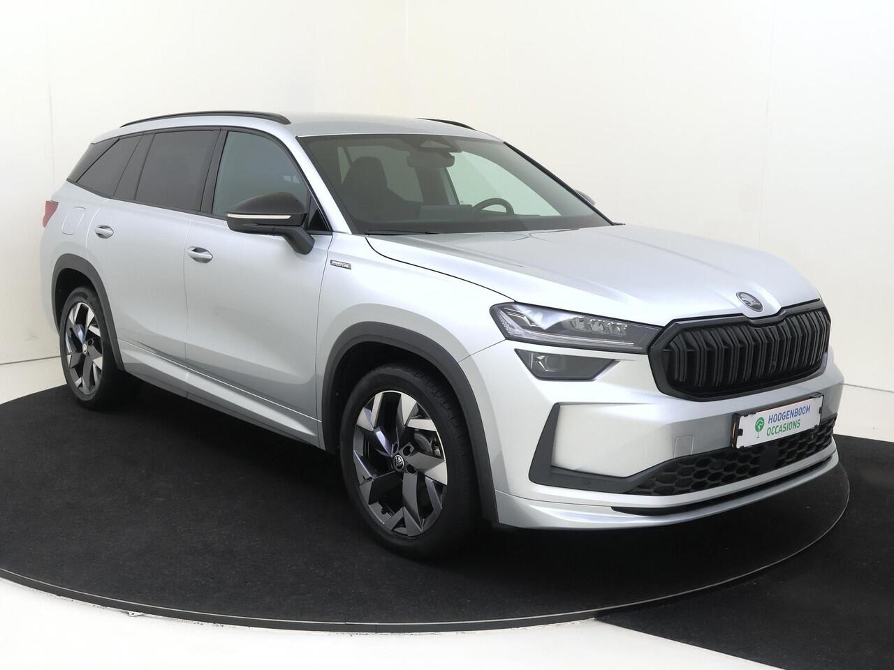 Skoda Kodiaq 1.5 TSI PHEV Sportline Business | Trekhaak | Achteruitrijcamera | 3-zone airco | Dodehoek detectie | Keyless | Adaptieve cruise control | CarPlay | Stoelverwarming |