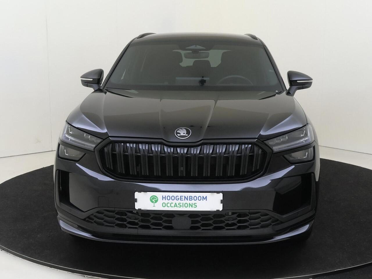 Skoda Kodiaq 1.5 TSI PHEV Sportline Business | Keyless | Stoelverwarming voor en achter | Verlichte grill | Achteruitrijcamera | Navigatie | Dodehoek detectie | Cruise controle | Sfeerverlichting |