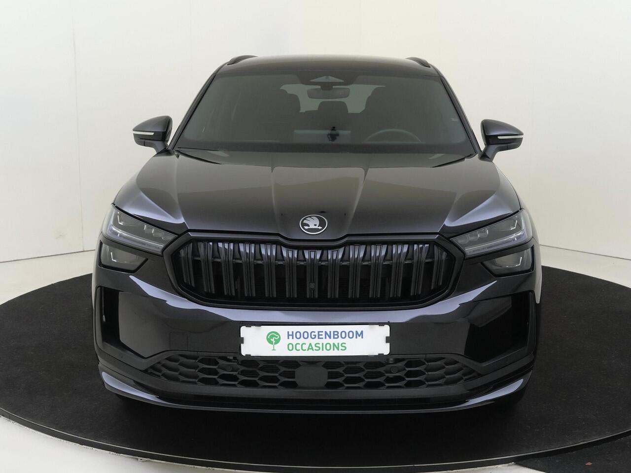 Skoda Kodiaq 1.5 TSI PHEV Sportline Business | Keyless | Stoelverwarming voor en achter | Verlichte grill | Achteruitrijcamera | Navigatie | Dodehoek detectie | Adaptieve cruise controle | Sfeerverlichting |
