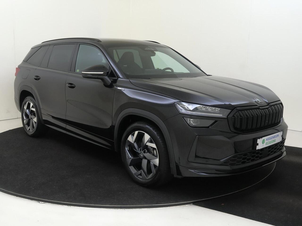 Skoda Kodiaq 1.5 TSI PHEV Sportline Business | Keyless | Stoelverwarming voor en achter | Verlichte grill | Achteruitrijcamera | Navigatie | Dodehoek detectie | Adaptieve cruise controle | Sfeerverlichting |