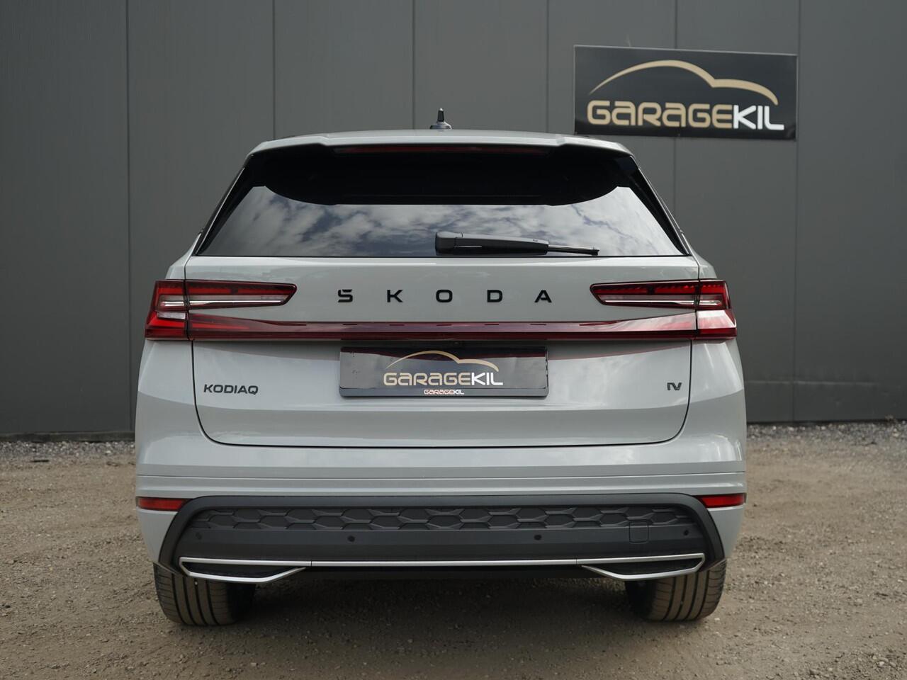 Skoda Kodiaq 1.5 TSI iV 150 kW DSG Sportline PHEV / Nieuw / Matrix / Panoramadak / Trekhaak / Lichtband in de grille / Achteruitrijcamera / Bestuurdersstoel met memory