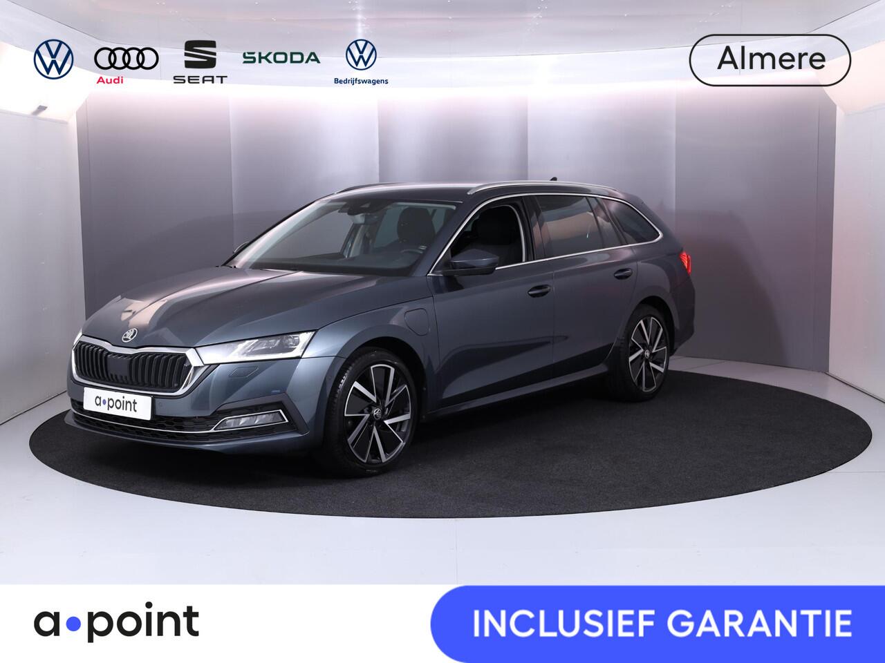 Skoda OCTAVIA Combi 1.4 TSI iV PHEV Business Edition Plus 204 pk Automaat (DSG) | Navigatie | Parkeersensoren (Park assist) | Achteruitrijcamera | Adaptieve cruise control | Stoelverwarming v/a | Elektr. voorstoelen met geheugen |