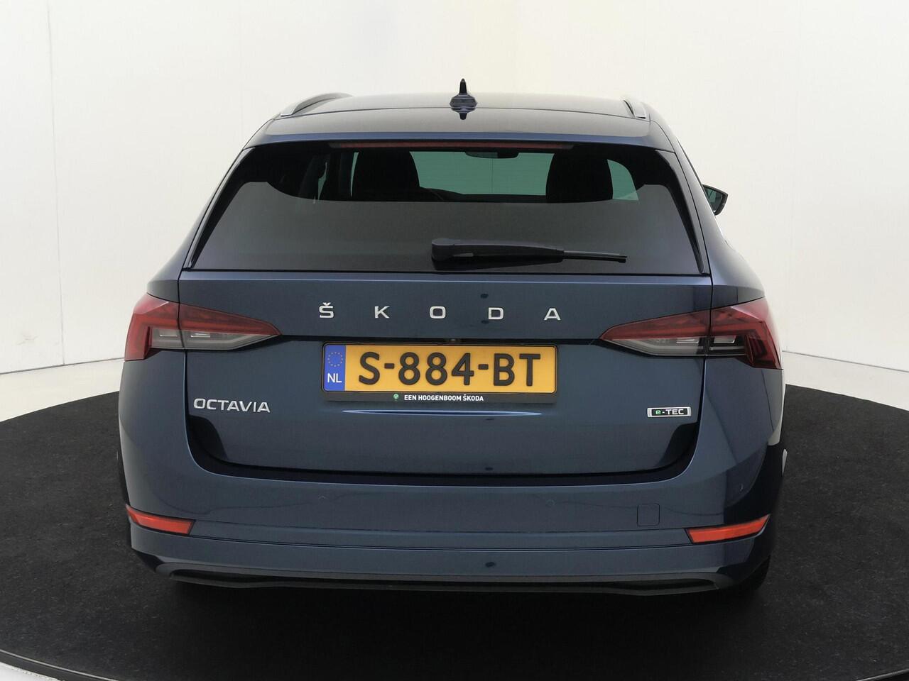 Skoda OCTAVIA Combi 1.0 e-TSI Business Edition | Trekhaak | Head-up display | Keyless | Achteruitrijcamera | Navigatie | Stoelverwarming | Dodehoek detectie | Cruise control |