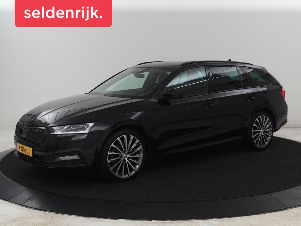 Skoda OCTAVIA 1.4 TSI iV PHEV Sportline | SOH 92% | Head-Up | Adaptive Cruise | Carplay | Stoelverwarming | Side Assist | Memory | Navigatie | Full LED | Sfeerverlichting | Canton Sound | PHEV | Plug In