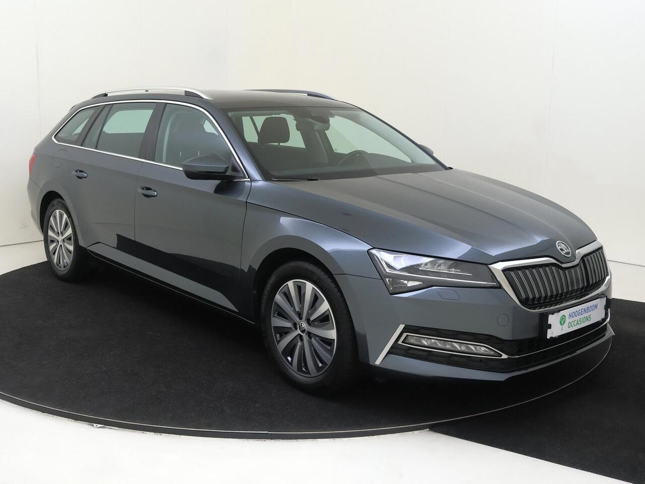 Skoda SUPERB Combi 1.4 TSI iV Business Edition | SoH 88% | Trekhaak | Adaptieve demping | Stoelverwarming | Navigatie | Cruise control | CarPlay | Elektrisch inklapbare buitenspiegels |