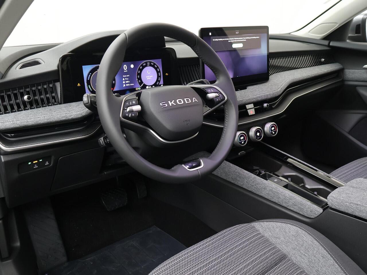 Skoda SUPERB Combi Business Edition 1.5 TSI PHEV 204 PK | Gratis E-Bike | Trekhaak | 18" Lichtmetalen velgen | Winter pakket |