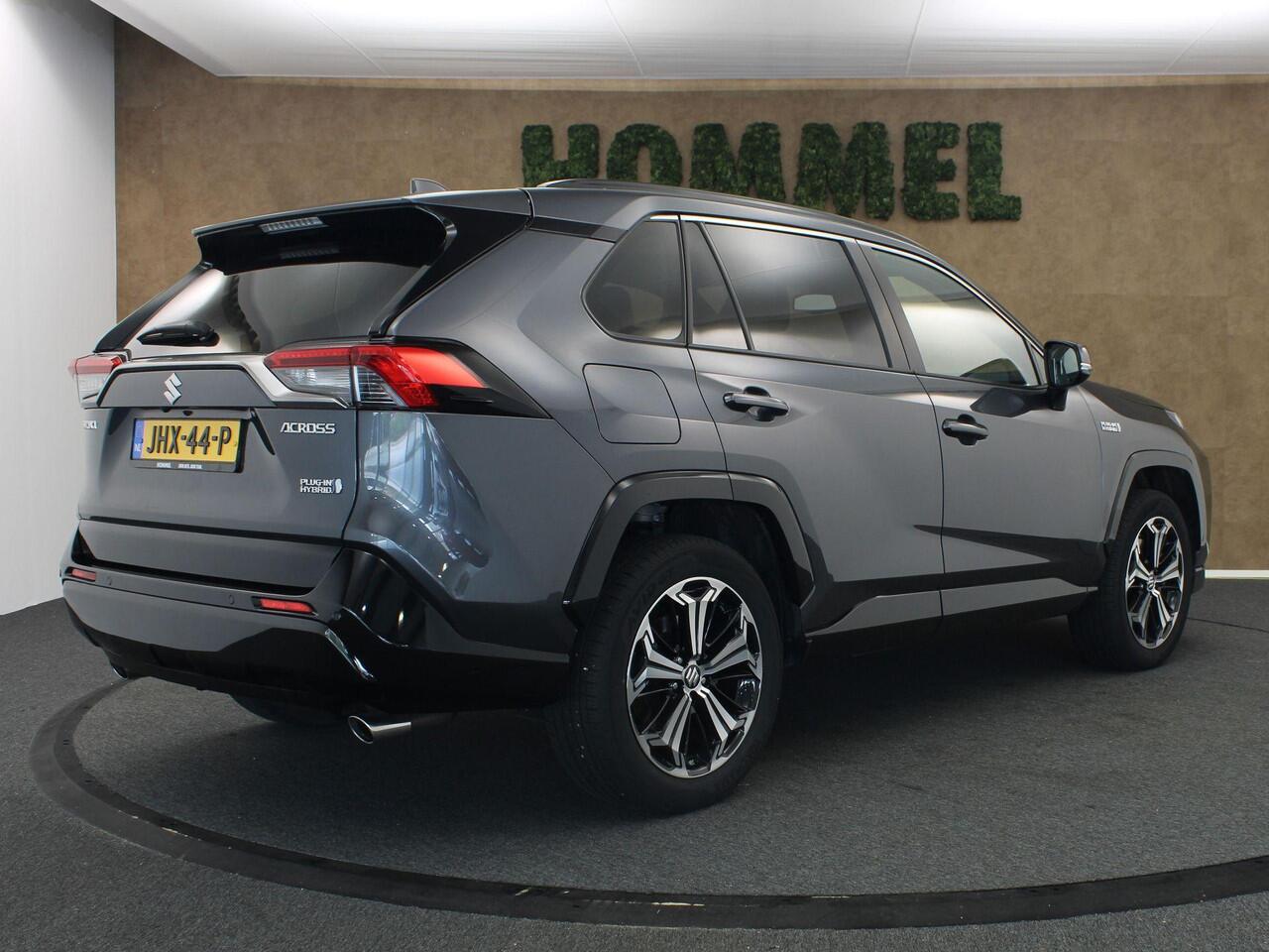 Suzuki Across 2.5 Plug-in Hybrid Style - ADAPTIEVE CRUISE CONTROL - AFNEEMBARE TREKHAAK (TREKGEWICHT 1500 KG GEREMD) - DODEHOEKDETECTIE - STOELVERWARMING VOOR + ACHTER - APPLE CARPLAY/ANDROID AUTO - EXTRA GETINT GLAS - STUURWIELVERWARMING