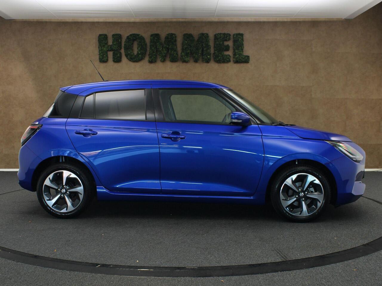 Suzuki SWIFT 1.2 Style Smart Hybrid - CLIMATE CONTROL - NAVIGATIE - PARKEERSENSOREN ACHTER - 16 INCH LICHT METALEN VELGEN - VREDESTEIN 4 SEIZOENENBANDEN - 4 X ELEKTRISCHE RAMEN - KEYLESS ENTRY/ START - CAMERA - VOORSTOELEN VERWARMD - DODEHOEK DETECTIE
