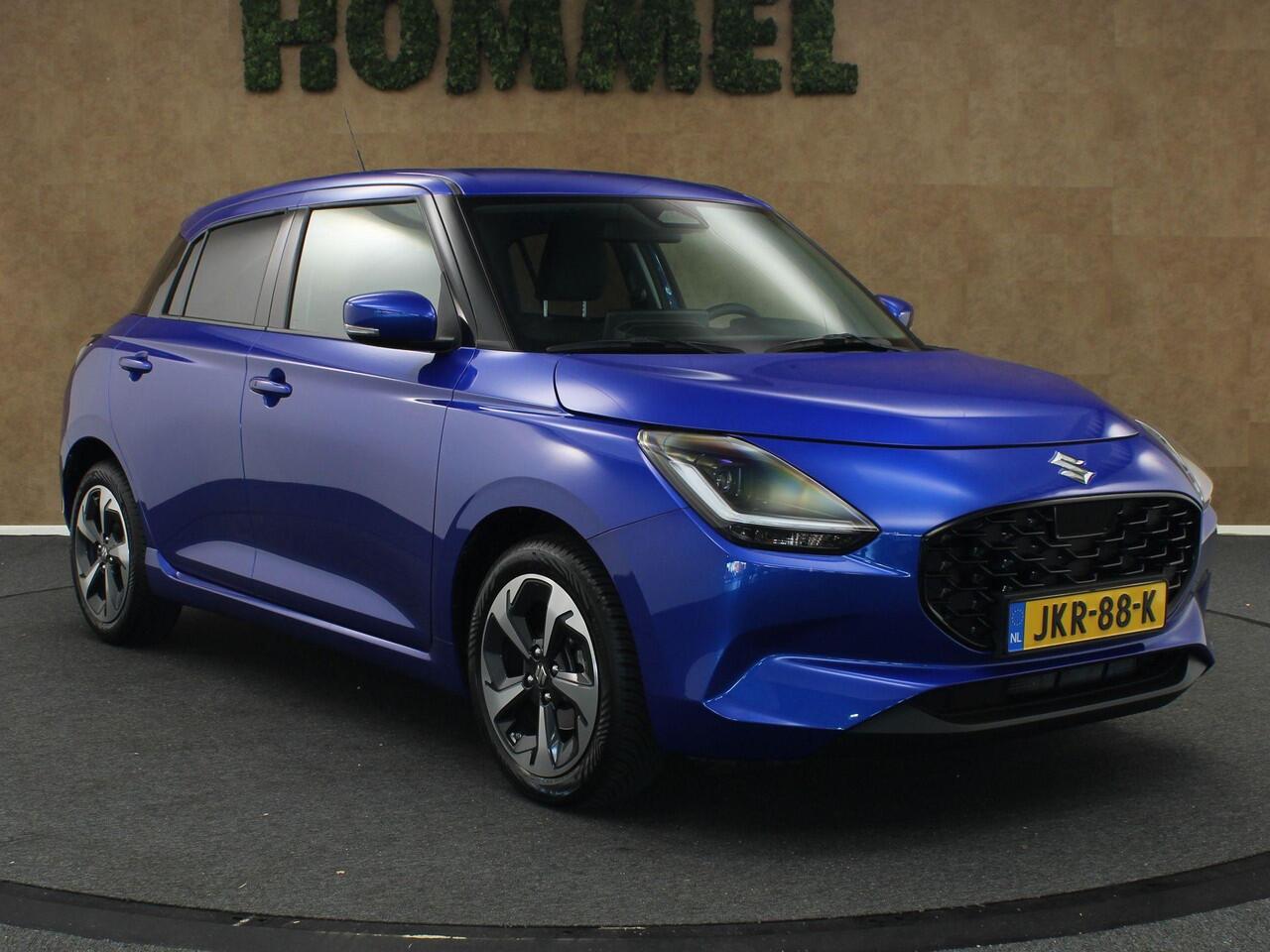 Suzuki SWIFT 1.2 Style Smart Hybrid - CLIMATE CONTROL - NAVIGATIE - PARKEERSENSOREN ACHTER - 16 INCH LICHT METALEN VELGEN - VREDESTEIN 4 SEIZOENENBANDEN - 4 X ELEKTRISCHE RAMEN - KEYLESS ENTRY/ START - CAMERA - VOORSTOELEN VERWARMD - DODEHOEK DETECTIE