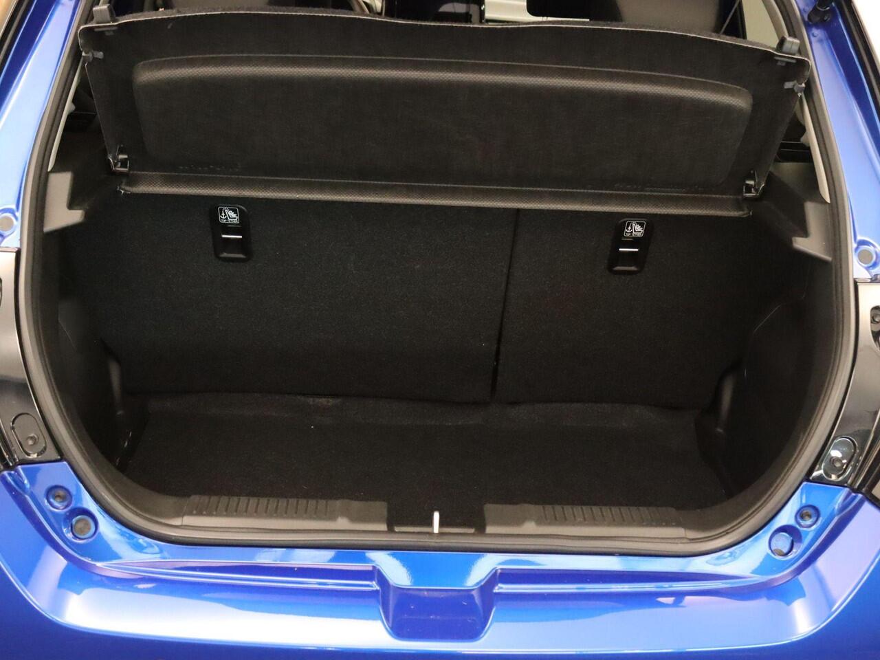 Suzuki SWIFT 1.2 Style Smart Hybrid - CLIMATE CONTROL - NAVIGATIE - PARKEERSENSOREN ACHTER - 16 INCH LICHT METALEN VELGEN - VREDESTEIN 4 SEIZOENENBANDEN - 4 X ELEKTRISCHE RAMEN - KEYLESS ENTRY/ START - CAMERA - VOORSTOELEN VERWARMD - DODEHOEK DETECTIE