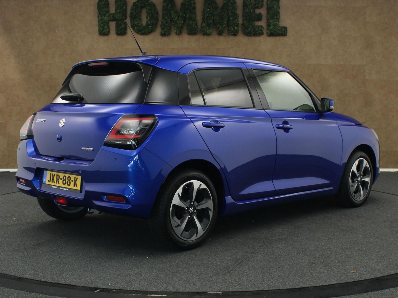 Suzuki SWIFT 1.2 Style Smart Hybrid - CLIMATE CONTROL - NAVIGATIE - PARKEERSENSOREN ACHTER - 16 INCH LICHT METALEN VELGEN - VREDESTEIN 4 SEIZOENENBANDEN - 4 X ELEKTRISCHE RAMEN - KEYLESS ENTRY/ START - CAMERA - VOORSTOELEN VERWARMD - DODEHOEK DETECTIE