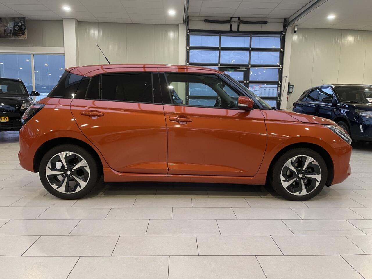 Suzuki SWIFT 1.2 Style HYBRID [ CLIMATE CONTROL | 10 JAAR GARANTIE ]