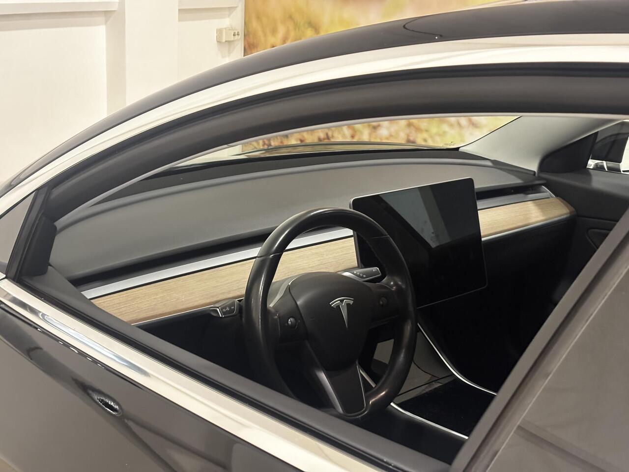 Tesla Model 3 Long Range RWD 75 kWh 80% SOH | Trekhaak | Autopilot | Lederen bekleding |