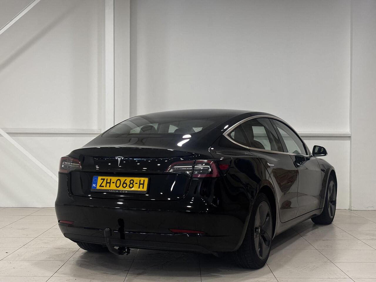 Tesla Model 3 Long Range RWD 75 kWh 80% SOH | Trekhaak | Autopilot | Lederen bekleding |