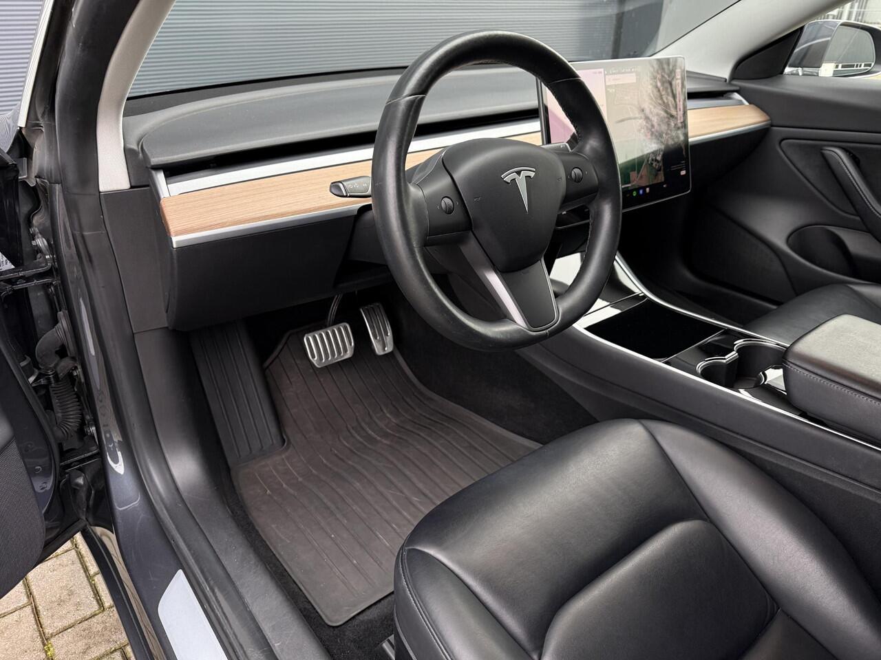 Tesla Model 3 Long Range RWD 75 kWh ?SOH 88.3% ?Autopilot ?Panoramadak ?Vol Leder ?360º Camera ?Stoelverwarming ?Origineel NL