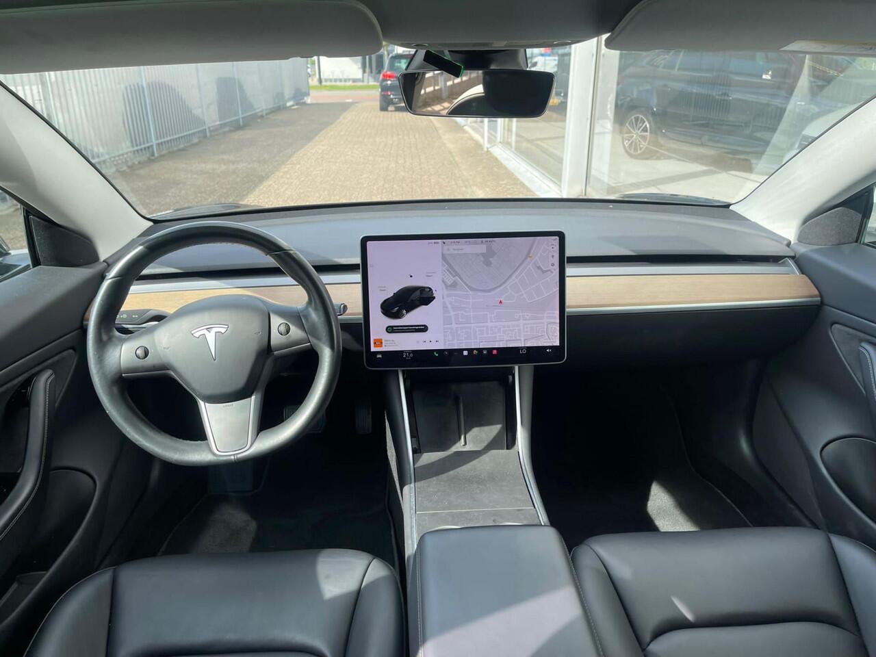 Tesla Model 3 | Long Range dual motor 485 km Actieradius | - 1e eigenaar | NAP | 4-WDRIVE -APK TOT 7 AUG 2027 | | 1e eigenaar | Navigatie | Panoramadak | Voorzien van trekhaak | Electronic climate control | Navigatiesysteem full map |