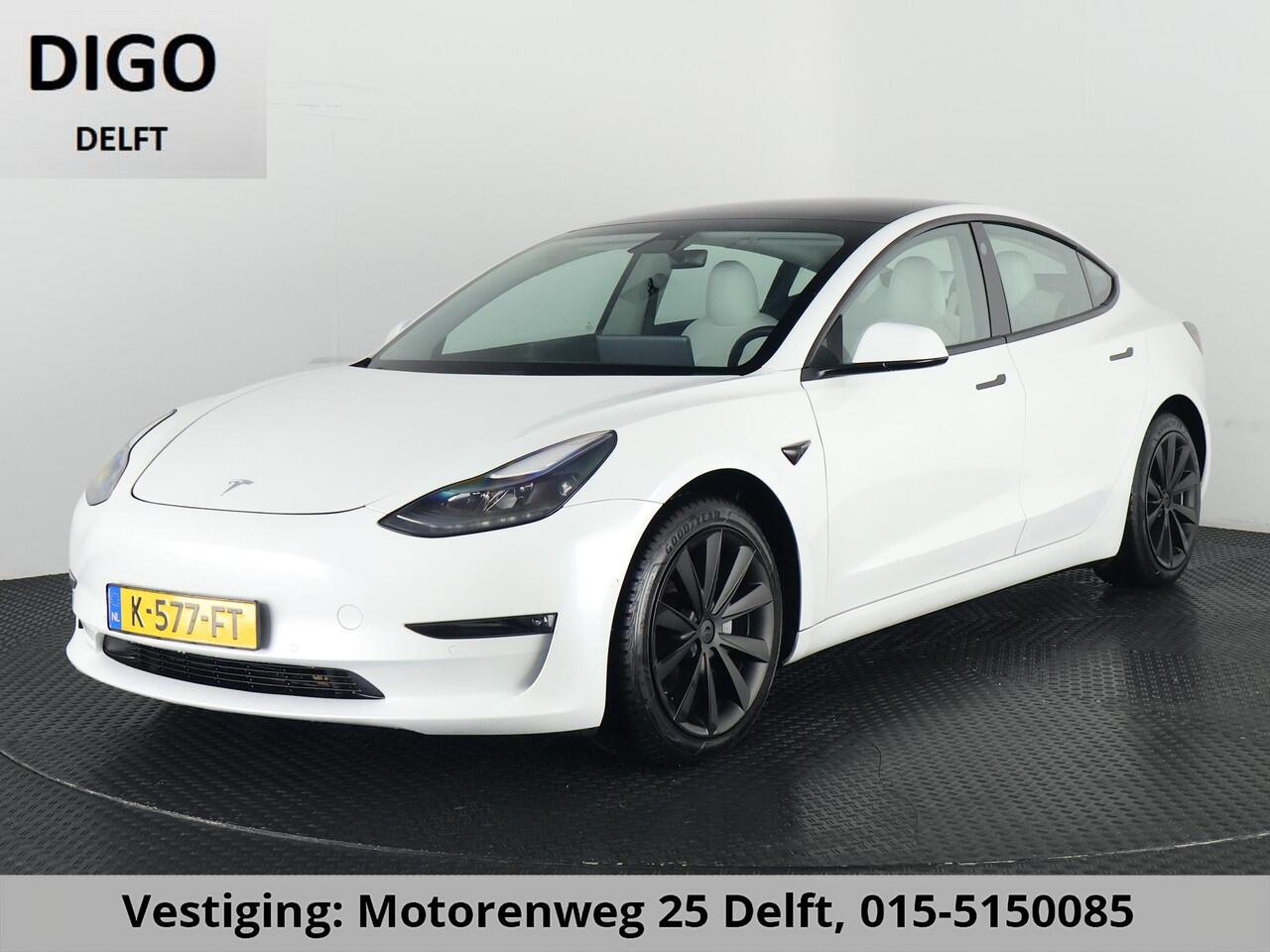 Tesla Model 3 LONGRANGE AWD 1e EIG ACCU SOH 92% ! GARANTIE 2031* RANGE TOT 592 KM WLTP !!! BIJNA 2021 .TREKHAAK . PANORAMA DAK . VOOR & ACHTERSTOELEN VERWARMD . KEYLESS