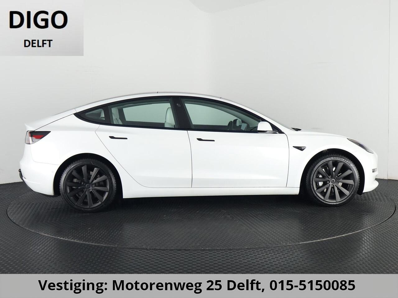 Tesla Model 3 LONGRANGE AWD 1e EIG ACCU SOH 92% ! GARANTIE 2031* RANGE TOT 592 KM WLTP !!! BIJNA 2021 .TREKHAAK . PANORAMA DAK . VOOR & ACHTERSTOELEN VERWARMD . KEYLESS