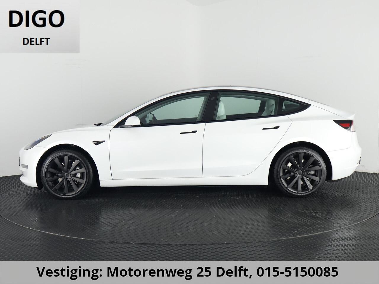 Tesla Model 3 LONGRANGE AWD 1e EIG ACCU SOH 92% ! GARANTIE 2031* RANGE TOT 592 KM WLTP !!! BIJNA 2021 .TREKHAAK . PANORAMA DAK . VOOR & ACHTERSTOELEN VERWARMD . KEYLESS