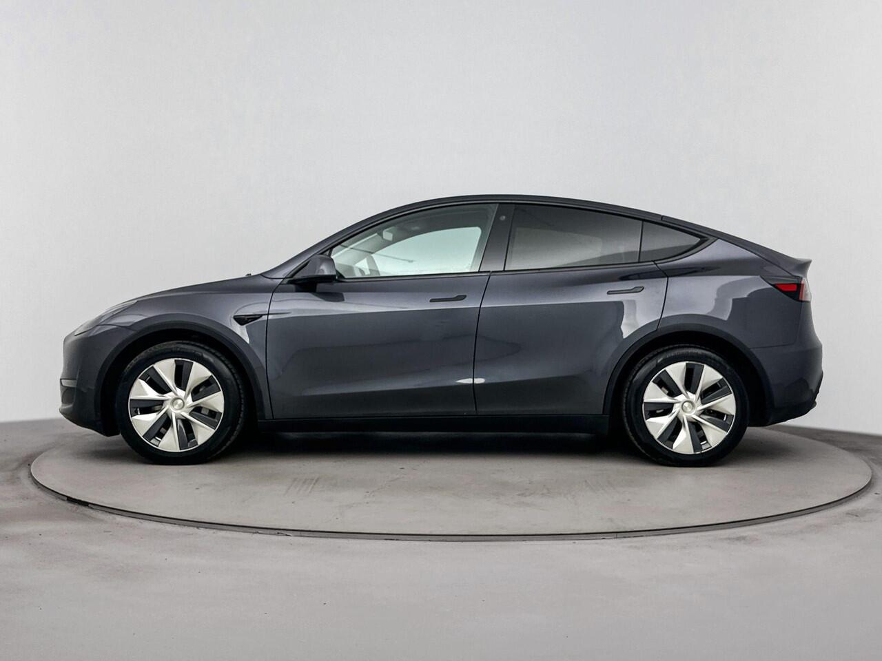 Tesla Model Y Long Range AWD 75 kWh | Leder | Panoramadak | Trekhaak afn.kogel | Navi | Cruise | Soh 91,8% |
