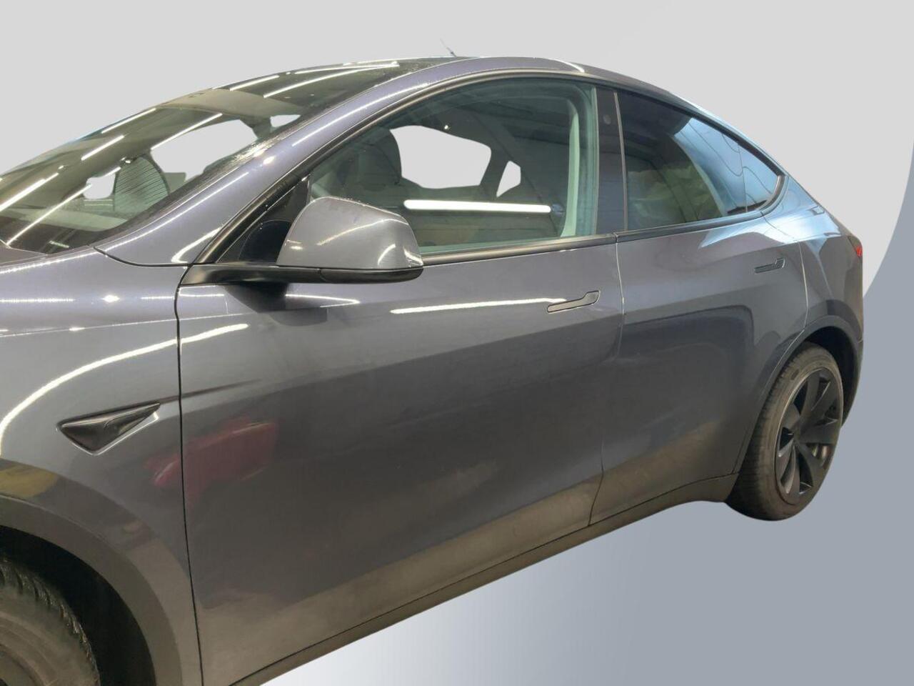 Tesla Model Y Long Range AWD 75 kWh 514pk | Trekhaak | Panoramadak |