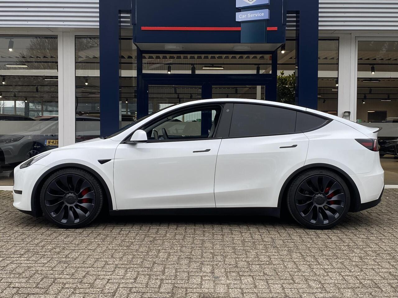 Tesla Model Y Performance AWD 75 kWh / Panodak / Stuurverwarming / Stoelverwarming V+A / Vol-Leder / Elektr.-Stoelen / Dodehoek-Detectie / Keyless / LED / Navi / 21'' LMV / ENZ.