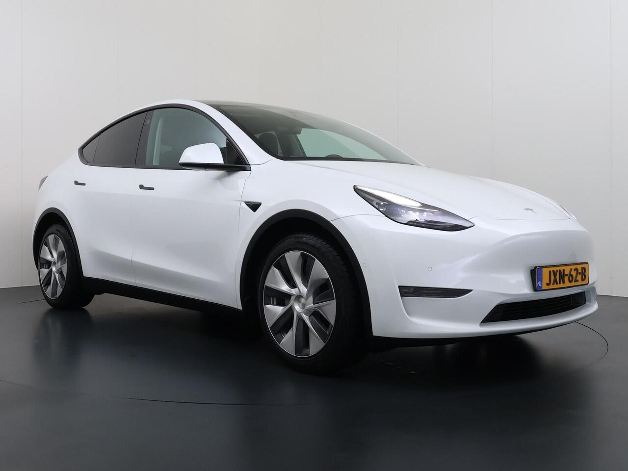 Tesla Model Y Long Range AWD 75 kWh VAN ¤37.900,- NU VOOR SLECHTS ¤34.440,- Uw LENTEVOORDEEL ¤3.460,- |SOH 96% | AUTOPILOT| TESLA GARANTIE OP DE HOOGVOLTACCU EN AANDRIJFLIJN TOT 2030 of 192.000KM | STOEL + STUURVERWARMING| ACHTERBANK VERWARMD
