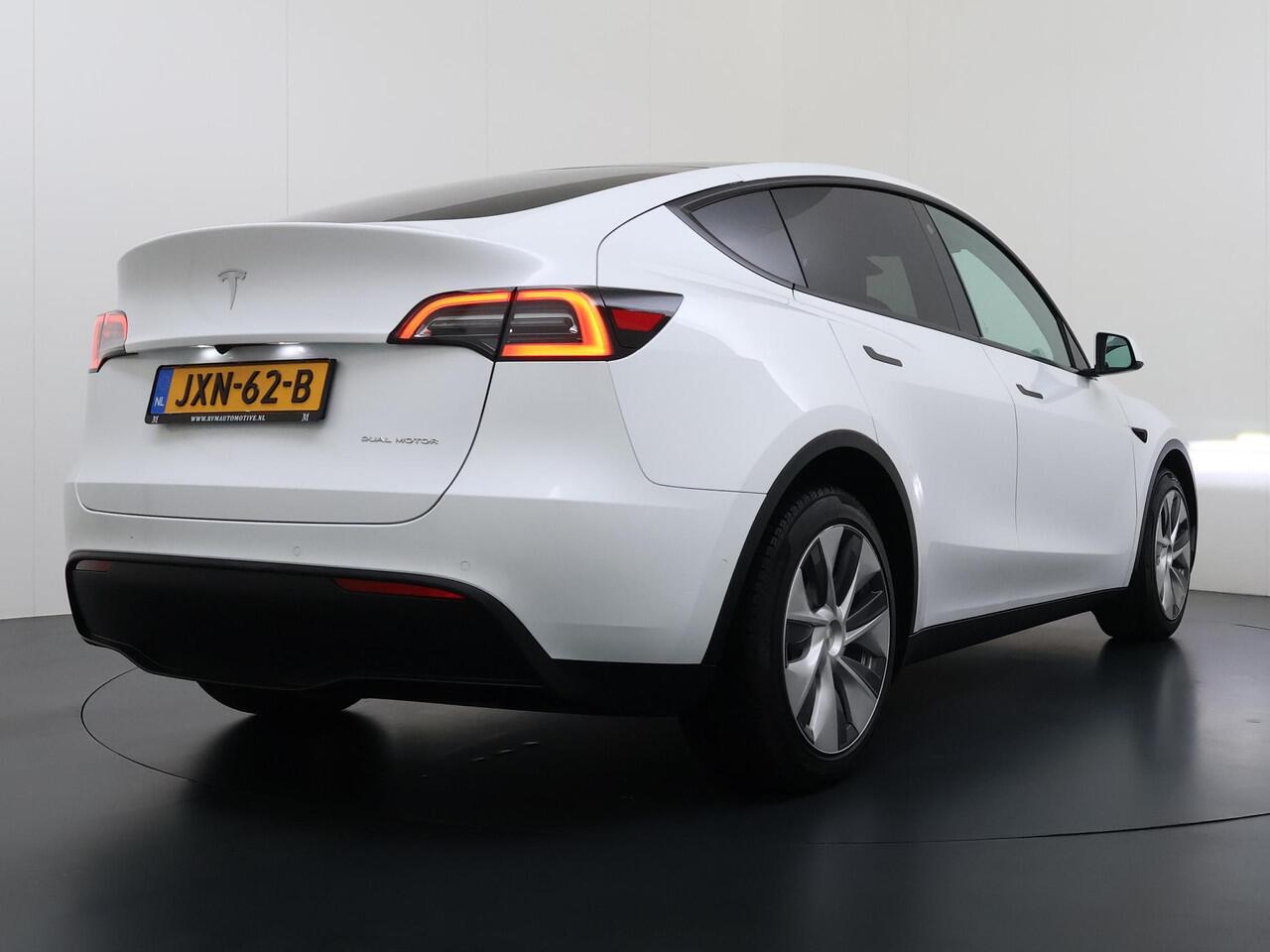 Tesla Model Y Long Range AWD 75 kWh VAN ¤37.900,- NU VOOR SLECHTS ¤34.440,- Uw LENTEVOORDEEL ¤3.460,- |SOH 96% | AUTOPILOT| TESLA GARANTIE OP DE HOOGVOLTACCU EN AANDRIJFLIJN TOT 2030 of 192.000KM | STOEL + STUURVERWARMING| ACHTERBANK VERWARMD