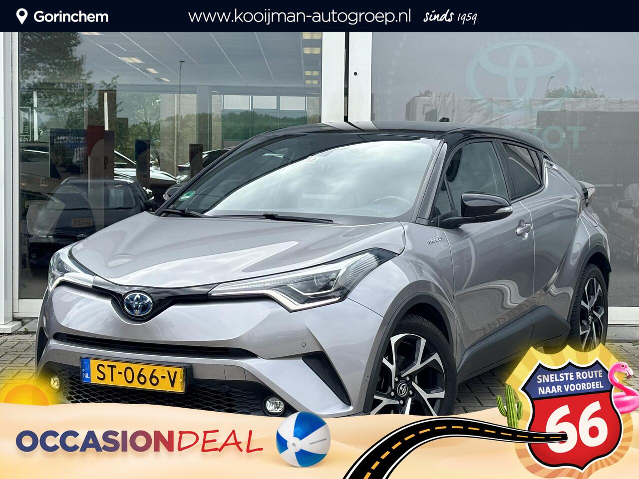 Toyota C-HR 1.8 Hybrid Bi-Tone | Leder | Stoelverwarming | Zomer + winterbanden | Parkeersensoren voor en achter | Toyota Garantie tot 2028!