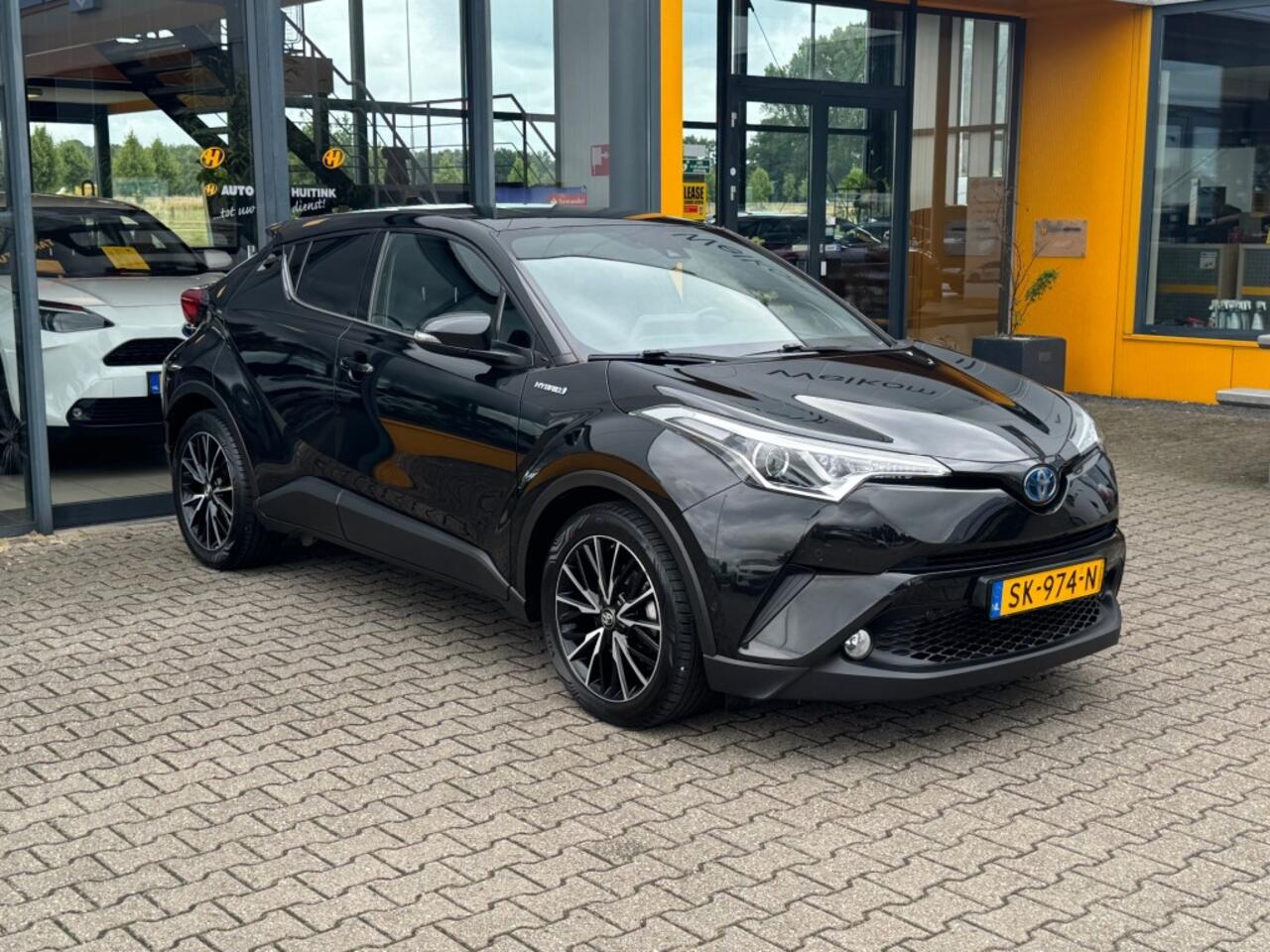 Toyota C-HR 1.8 Hybrid Style - camera - navi - stoelverwarming