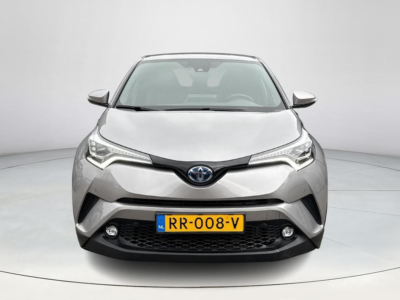 Toyota C-HR 1.8 Hybrid Executive **NAVIGATIE/ DODEHOEK DETECTIE/ STOEL EN STUURWIELVERWARMING/ GARANTIE**