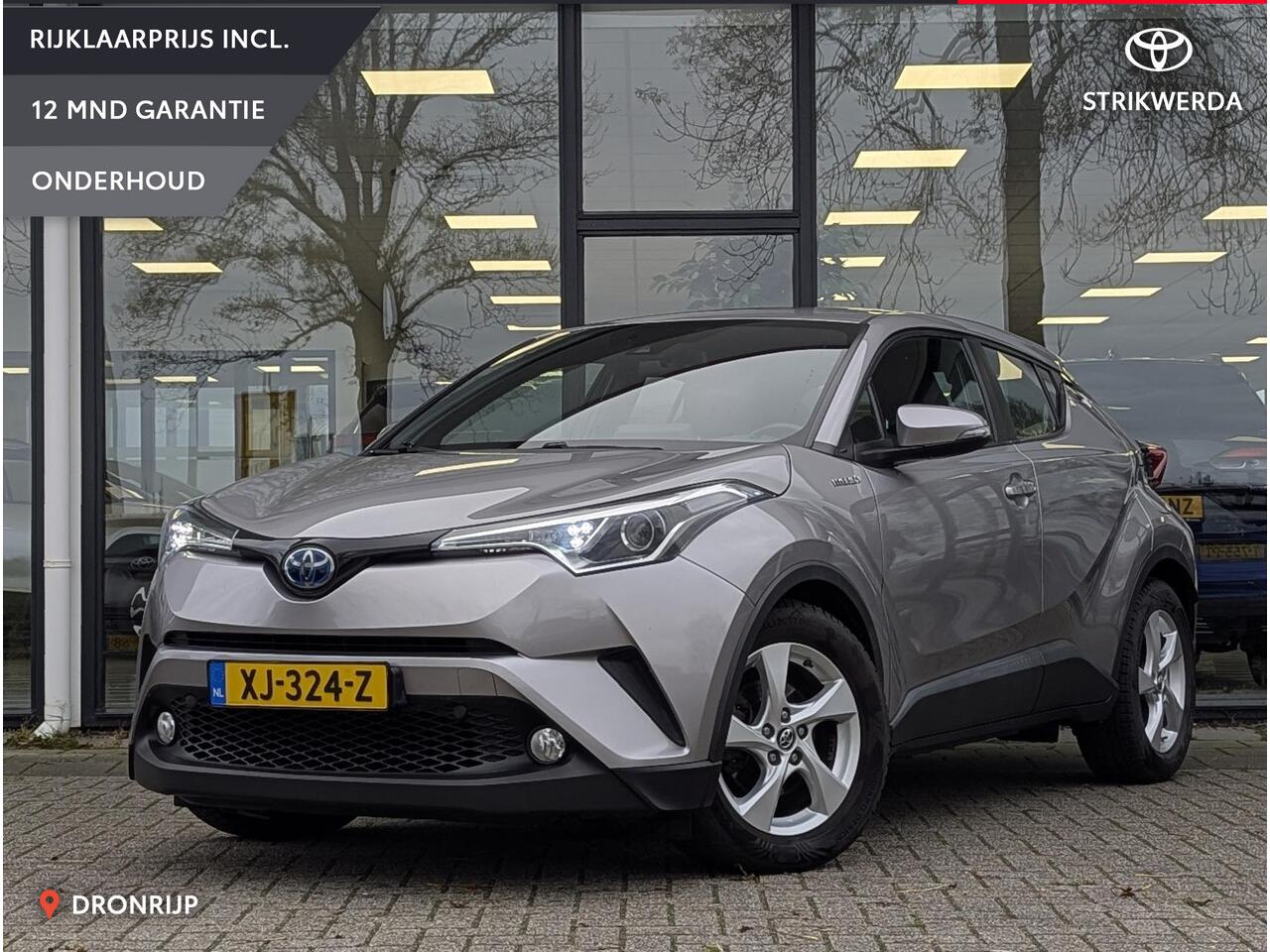 Toyota C-HR 1.8 Hybrid Active | Afn. Trekhaak | All-season | Navi | Adaptieve cruise | Climate control | Camera