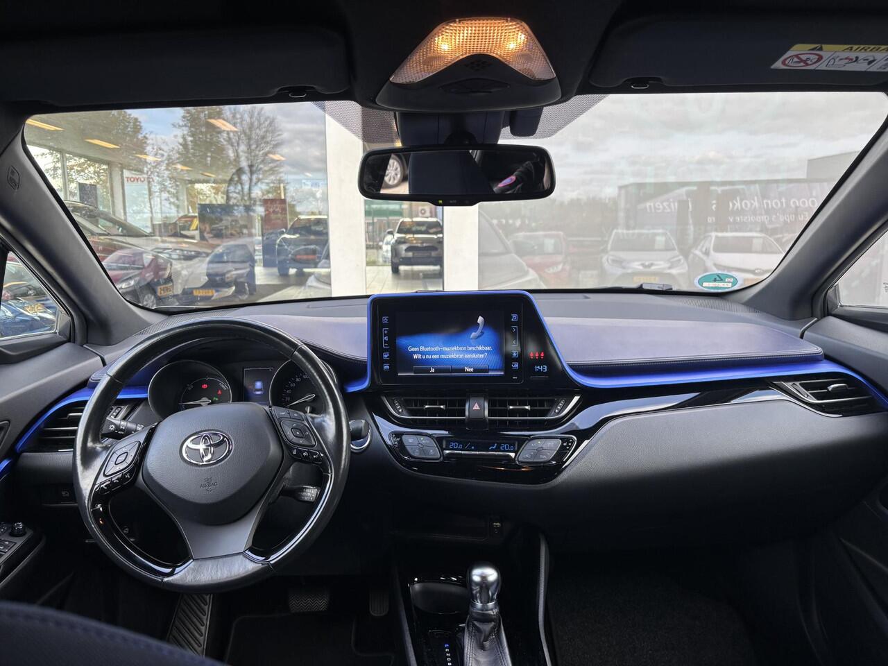 Toyota C-HR 1.8 Hybrid Bi-Tone | Stoel en stuurverwarming | Navigatie | Blindspot | Toyota garantie tot 2028!