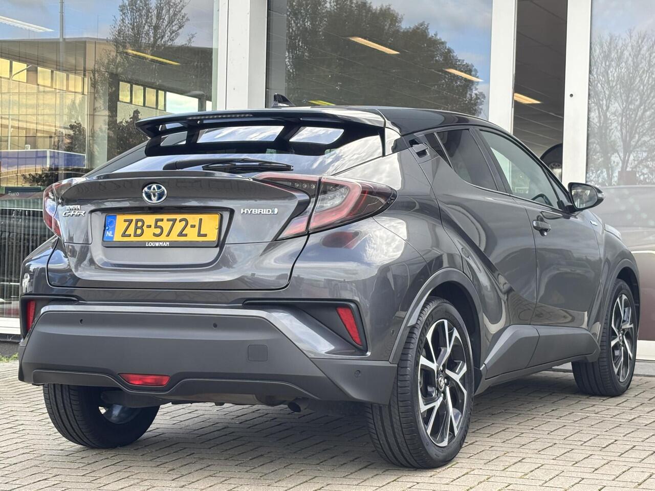 Toyota C-HR 1.8 Hybrid Bi-Tone | Stoel en stuurverwarming | Navigatie | Blindspot | Toyota garantie tot 2028!