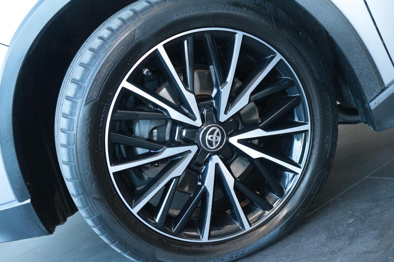 Toyota C-HR 1.8 Hybrid Bi-Tone Limited, Leder, Navi, JBL Stoelverwarming, Navigatie, BSM, Keyless Entry / start, Parkeercamera