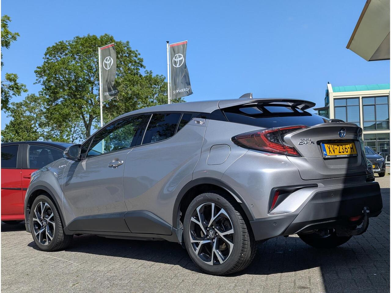 Toyota C-HR 1.8 Hybrid Style | Clima | Cruise | Navi | JBL | Stoelverw. | Trekhaak | BSM