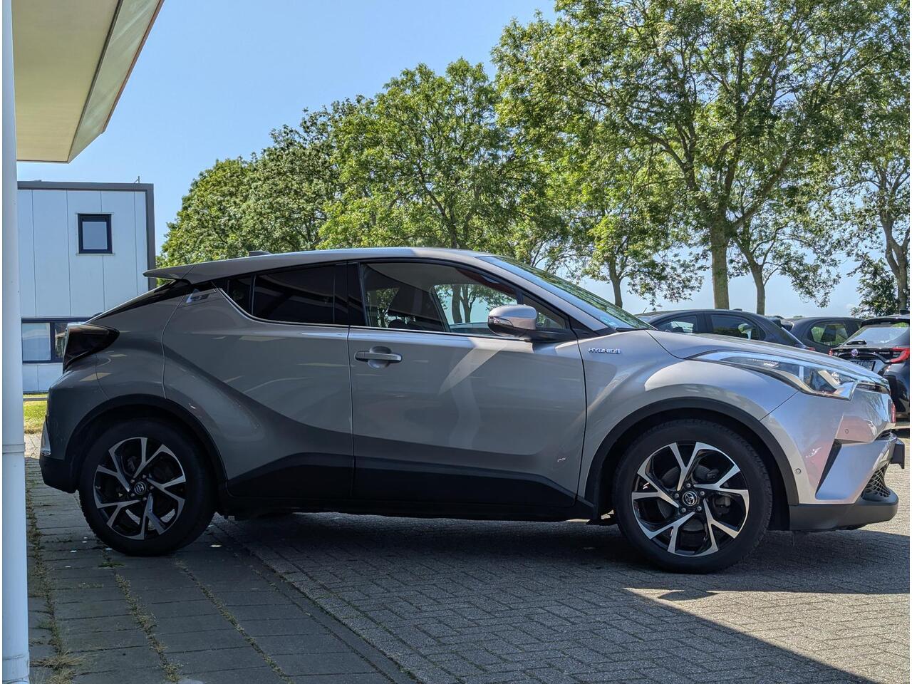 Toyota C-HR 1.8 Hybrid Style | Clima | Cruise | Navi | JBL | Stoelverw. | Trekhaak | BSM