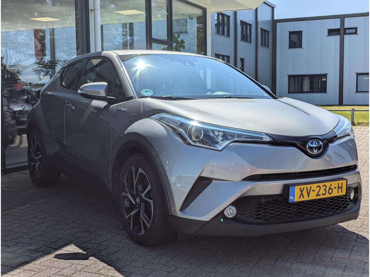 Toyota C-HR 1.8 Hybrid Style | Clima | Cruise | Navi | JBL | Stoelverw. | Trekhaak | BSM