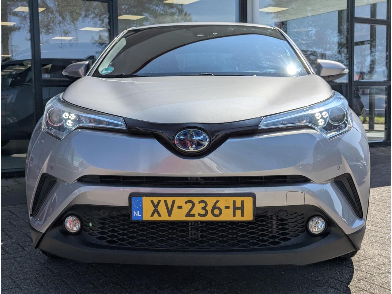 Toyota C-HR 1.8 Hybrid Style | Clima | Cruise | Navi | JBL | Stoelverw. | Trekhaak | BSM