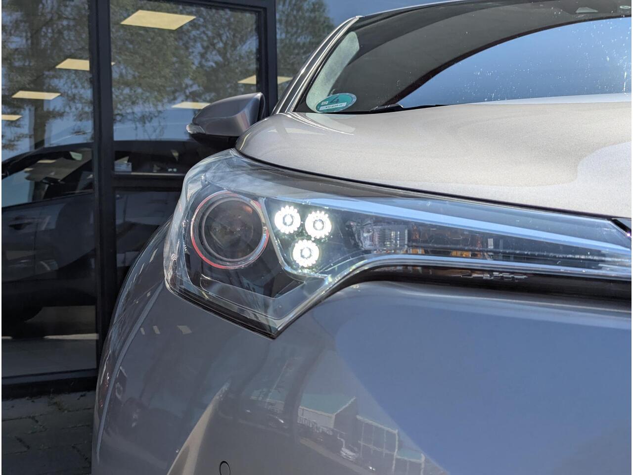 Toyota C-HR 1.8 Hybrid Style | Clima | Cruise | Navi | JBL | Stoelverw. | Trekhaak | BSM