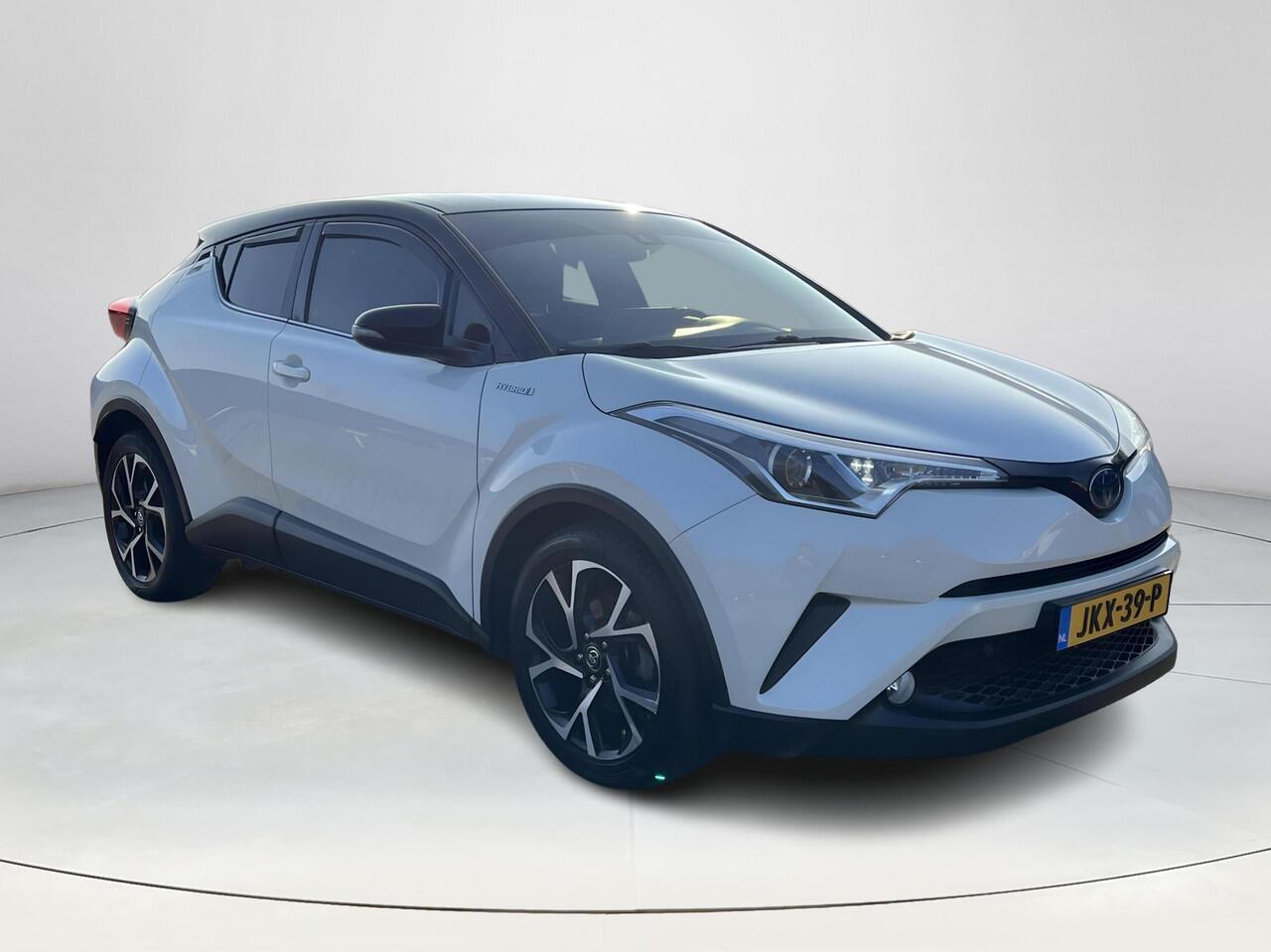 Toyota C-HR 1.8 Hybrid Bi-Tone | Navigatie | Stoelverwarming | 18 inch LM-Velgen | Trekhaak |